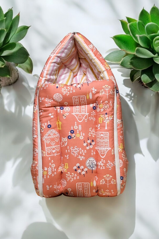 Organic Cotton Onesies & Muslin Swaddles With Orange Sleeping Bag