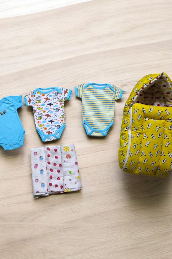 Organic Cotton Onesies & Muslin Swaddles With Yellow Sleeping Bag